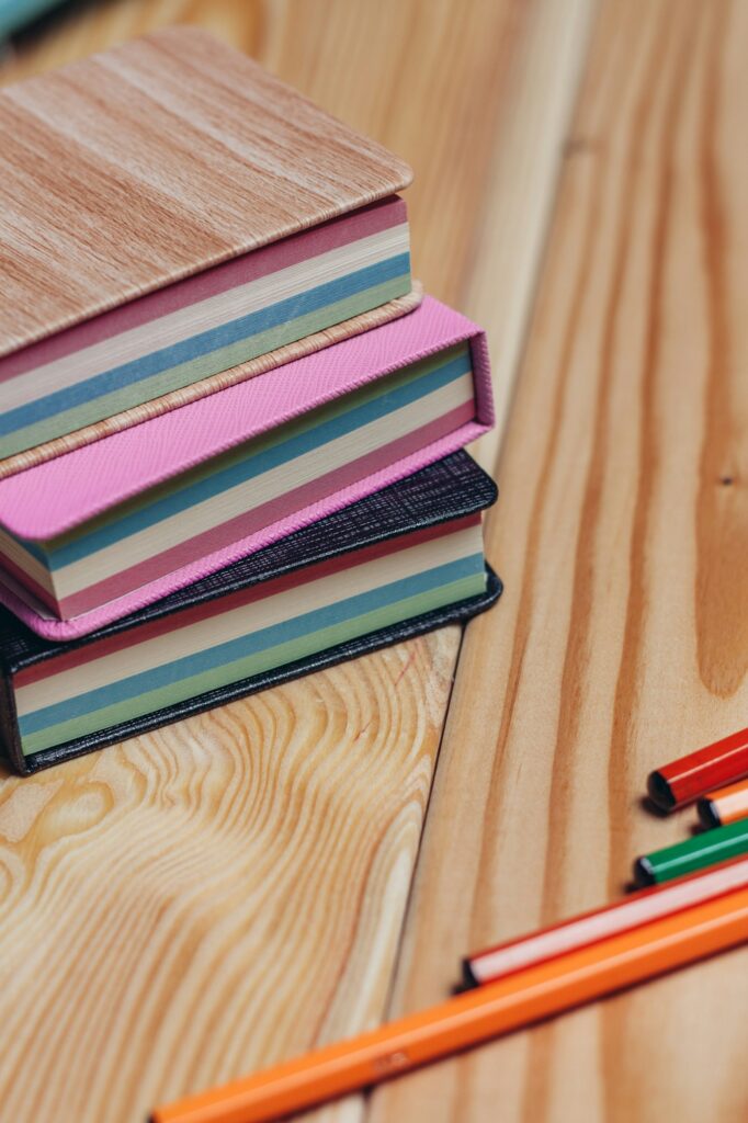 colorful notepads office wooden table paper work is education